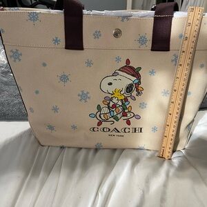 Snoopy Coach tote. NEW - Never used, with tags. Ruler added to show size.